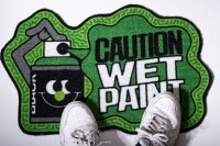 Montana Doormat Caution Wet Paint Green